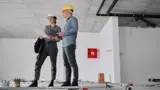 2 people at construction site