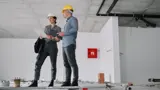 2 people at construction site
